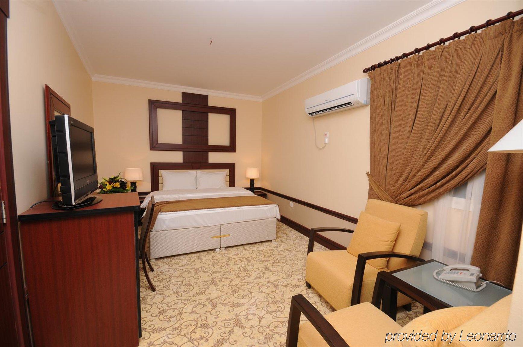 La Villa Palace Hotel Doha Room photo